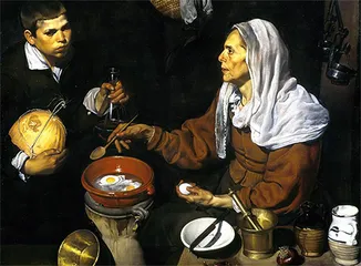 Vieja friendo huevos
